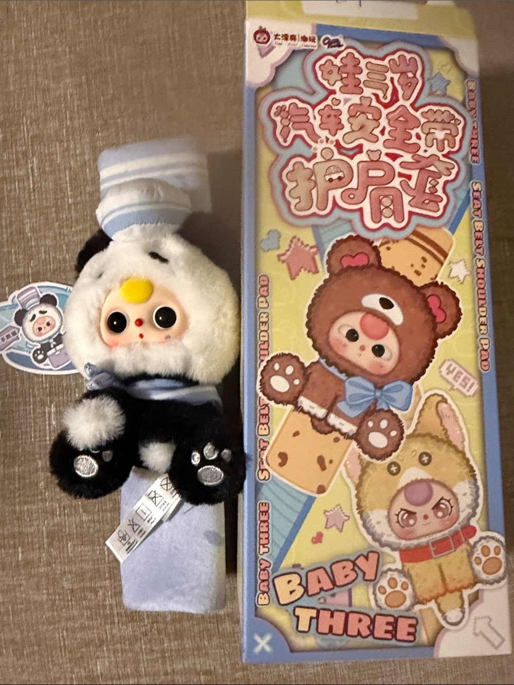 NWT Baby three Plush Panda seatbelt cover  with Blue Accents